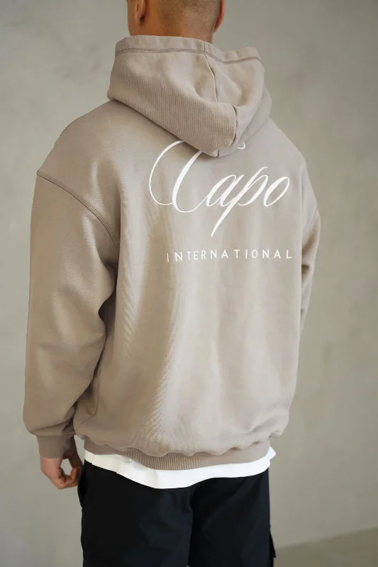 hoodie for relaxed outfits -Capo International Hoodie - Beige